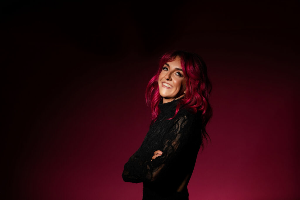 york-pa-portrait-photography-woman-pink-hair-red-background