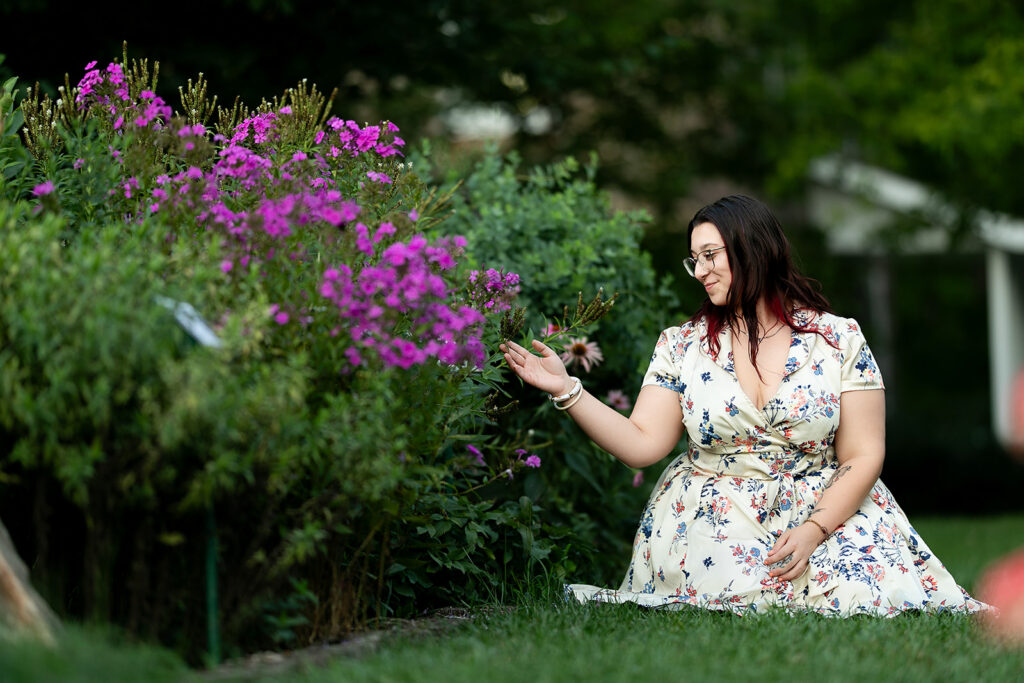Outdoor portrait surrounded by blooming summer flowers at John Rudy Park in York County.John Rudy Park portraits